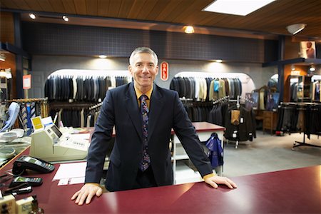 service with smile cashier - Sales Associate in Men's Clothing Store Stock Photo - Rights-Managed, Code: 700-01694619