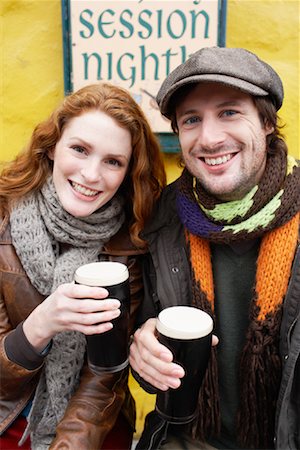 Couple with Beers on Bar Patio, Ireland Stock Photo - Rights-Managed, Code: 700-01694907