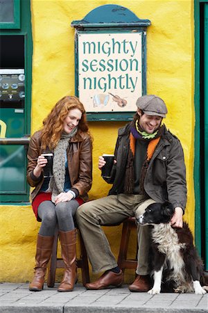 pubs ireland pictures - Couple Petting Dog by Pub, Ireland Stock Photo - Rights-Managed, Code: 700-01694909