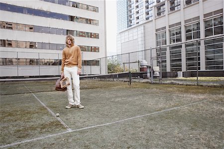 Portrait of Man on Tennis Court Stock Photo - Rights-Managed, Code: 700-01695210