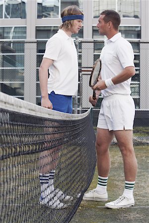 Tennis Rivals Standing at Net Stock Photo - Rights-Managed, Code: 700-01695235