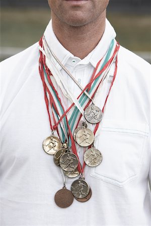 View of Tennis Player's Chest with Medals Stock Photo - Rights-Managed, Code: 700-01695245