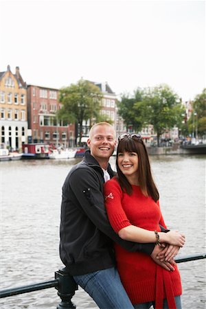 simsearch:700-00515032,k - Couple by Canal, Amsterdam, Netherlands Stock Photo - Rights-Managed, Code: 700-01695520