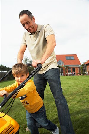 Father and Son Mowing the Lawn Stock Photo - Rights-Managed, Code: 700-01716505