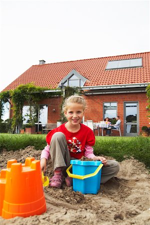 Girl Playing in Sand Stock Photo - Rights-Managed, Code: 700-01716512