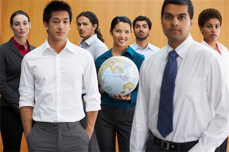 Businesswoman in Group Holding Globe Stock Photo - Rights-Managed, Code: 700-01764240