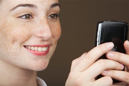 Woman with Cellular Phone Stock Photo - Rights-Managed, Code: 700-01764275