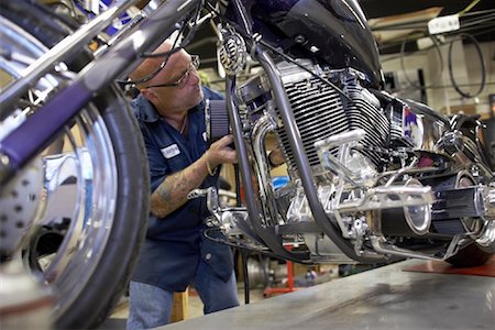 simsearch:700-00193680,k - Mechanic Working on Motorcycle Stock Photo - Rights-Managed, Code: 700-01764862