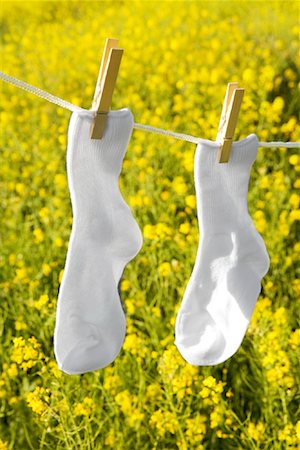 pinned - Socks on Clothesline Stock Photo - Rights-Managed, Code: 700-01787514