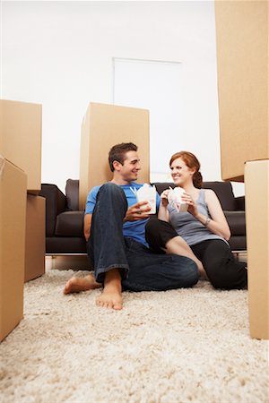 shag carpet - Couple Eating Take-Out in New Home Stock Photo - Rights-Managed, Code: 700-01792360