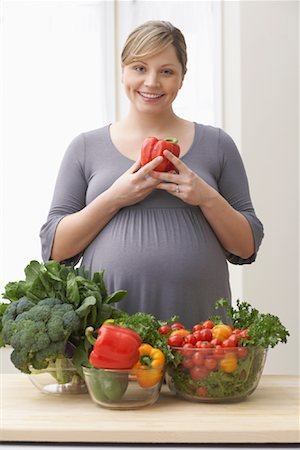 pregnant expanding - Pregnant Woman With Vegetables Stock Photo - Rights-Managed, Code: 700-01837440