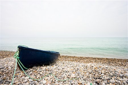 pebbles on shore - Rowing Boat on Shingle Beach, Devon, England Stock Photo - Rights-Managed, Code: 700-01953806