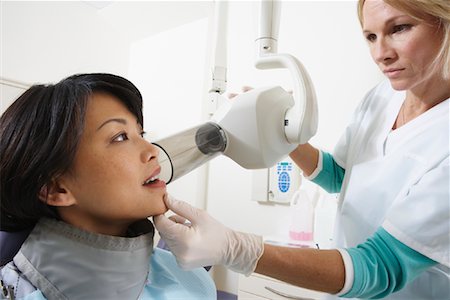 dental bib - Woman Receiving Dental X-Ray Stock Photo - Rights-Managed, Code: 700-01993021