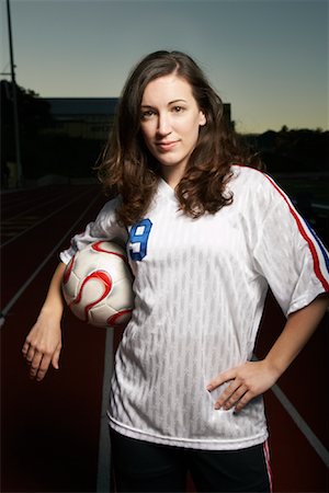 soccer player holding ball - Female Soccer Player Stock Photo - Rights-Managed, Code: 700-02010479