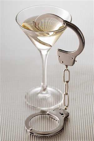 Handcuffs on Martini Glass Stock Photo - Rights-Managed, Code: 700-02038257