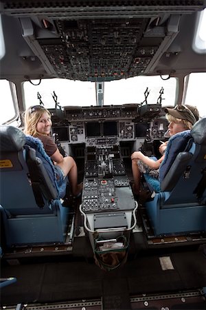 Kids in Cockpit of Plane, Warbird Airshow, Titusville, Brevard County, Flordia, USA Stock Photo - Rights-Managed, Code: 700-02045891
