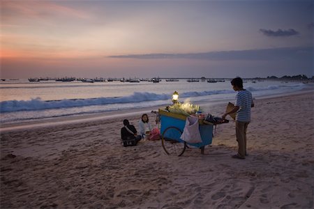People by Vendor Cart on Beach, Indonesia Stock Photo - Rights-Managed, Code: 700-02046371