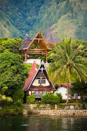 sumatra tourist destinations - Traditional Buildings on Lake Shore, Lake Toba, Sumatra, Indonesia Stock Photo - Rights-Managed, Code: 700-02046531