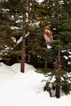 Woman Climbing Tree Stock Photo - Rights-Managed, Code: 700-02046914