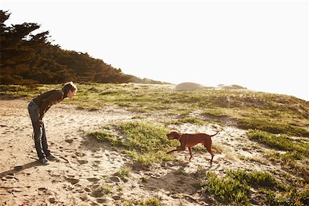 fetch - Woman Playing with Dog Stock Photo - Rights-Managed, Code: 700-02046930