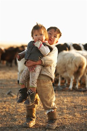 sheep family - Boy Lifting Sister, Khustain Nuruu National Park, Mongolia Stock Photo - Rights-Managed, Code: 700-02046988