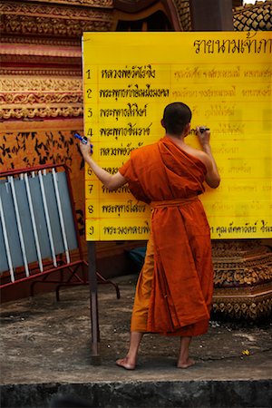 Monk Writing on Display Board, Chiang Rai, Thailand Stock Photo - Rights-Managed, Code: 700-02047020