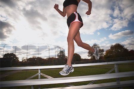 Woman Exercising on Bleachers Stock Photo - Rights-Managed, Code: 700-02056694