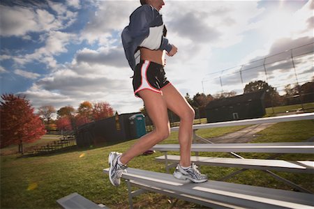Woman Exercising on Bleachers Stock Photo - Rights-Managed, Code: 700-02056692