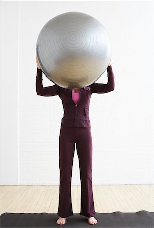 Woman Holding Exercise Ball Stock Photo - Rights-Managed, Code: 700-02071551