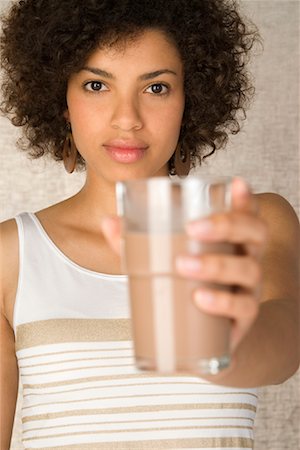 Portrait of Woman Drinking Chocolate Milk Stock Photo - Rights-Managed, Code: 700-02080451