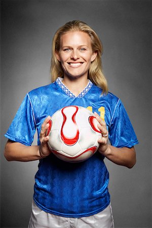 soccer player holding ball - Portrait of Soccer Player Stock Photo - Rights-Managed, Code: 700-02080652