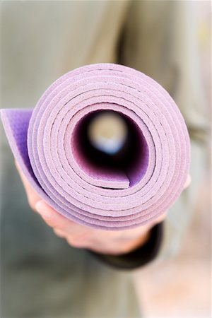 Close-Up of Rolled Up Yoga Mat Stock Photo - Rights-Managed, Code: 700-02125513