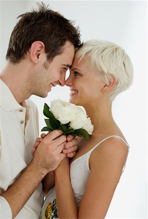 simsearch:614-06896801,k - Young Couple with Bouquet of Roses Stock Photo - Rights-Managed, Code: 700-02129039