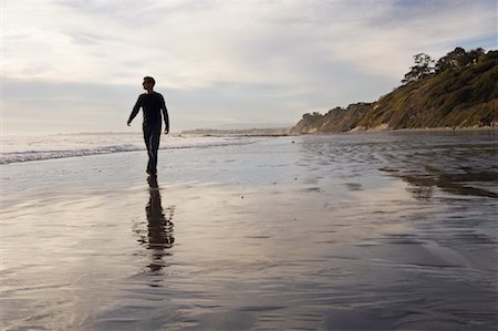 simsearch:600-02046089,k - Man Walking on Arroyo Burro Beach Santa Barbara, California, USA Stock Photo - Rights-Managed, Code: 700-02121088