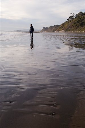 simsearch:600-02046089,k - Man Walking on Arroyo Burro Beach Santa Barbara, California, USA Stock Photo - Rights-Managed, Code: 700-02121089