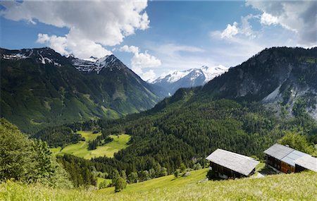 Cabins on Mountainside, Nationalpark Hohe Tauern, Austria Stock Photo - Rights-Managed, Code: 700-02121176