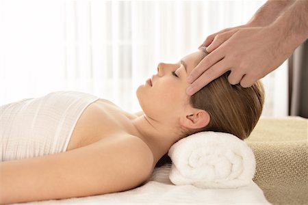 photo of a woman touching a man face - Woman Getting a Massage Stock Photo - Rights-Managed, Code: 700-02121355