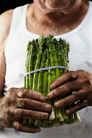 Man Holding Aspargus Stock Photo - Rights-Managed, Code: 700-02199953