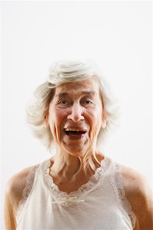 serious older woman looking at camera - Portrait of Woman Stock Photo - Rights-Managed, Code: 700-02199985