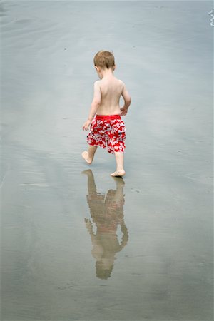 Boy Walking on the Beach Stock Photo - Rights-Managed, Code: 700-02200569