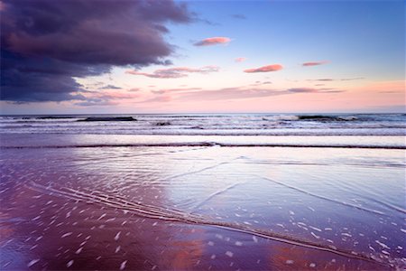 simsearch:6105-07744394,k - Surf on Beach at Sunset, St Cyrus National Nature Reserve, Montrose Bay, Scotland Stock Photo - Rights-Managed, Code: 700-02217228