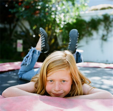 red hair preteen girl - Girl on Trampoline, Costa Mesa, California, USA Stock Photo - Rights-Managed, Code: 700-02217520