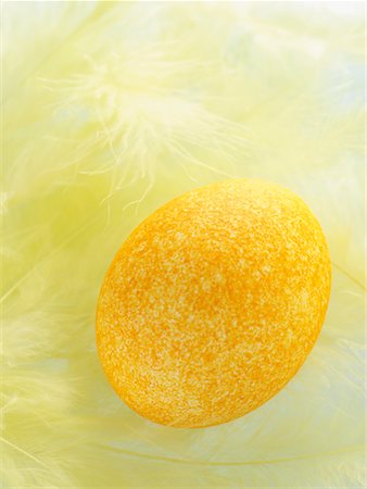 simsearch:700-01173313,k - Orange Easter Egg Nestled in Yellow Feathers Stock Photo - Rights-Managed, Code: 700-02245198