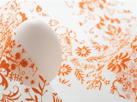 simsearch:700-01173313,k - Ribbon Wrapped Around Egg Stock Photo - Rights-Managed, Code: 700-02245191