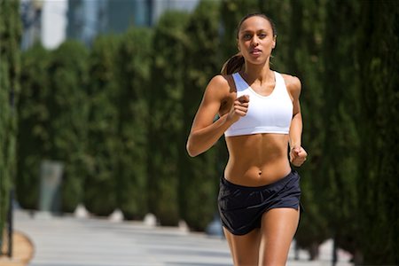 simsearch:700-02245399,k - Woman Jogging, San Diego, California, USA Stock Photo - Rights-Managed, Code: 700-02245401