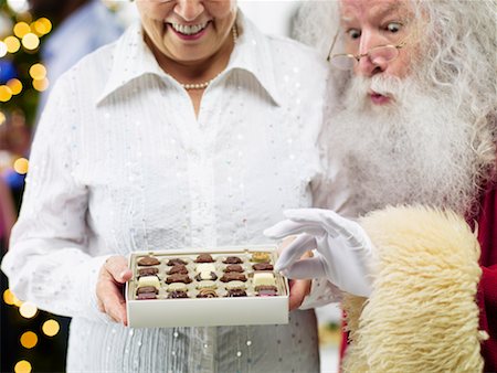 simsearch:700-02264289,k - Santa Claus Sneaking Chocolates Stock Photo - Rights-Managed, Code: 700-02264277
