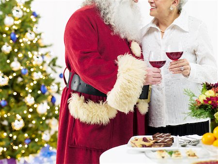 simsearch:700-02264289,k - Woman Drinking Wine With Santa Claus at Christmas Party Stock Photo - Rights-Managed, Code: 700-02264288