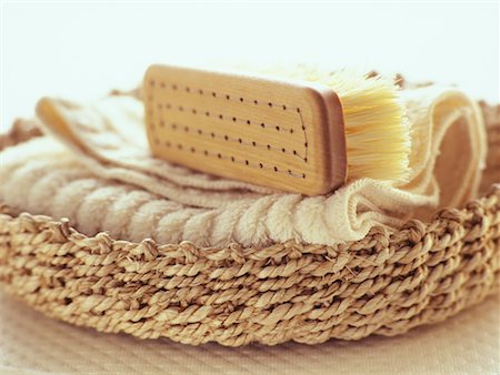 Scrub Brush and Wash Cloth on Wicker Basket Stock Photo - Rights-Managed, Code: 700-02264635