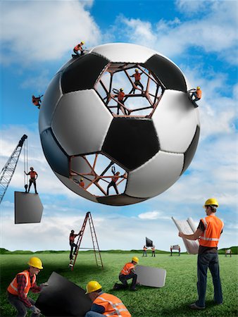 Construction Workers Building a Soccer Ball Stock Photo - Rights-Managed, Code: 700-02264970