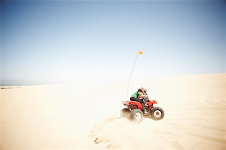 Couple on Off-Road Vehicle Foto de stock - Con derechos protegidos, Código: 700-02265430